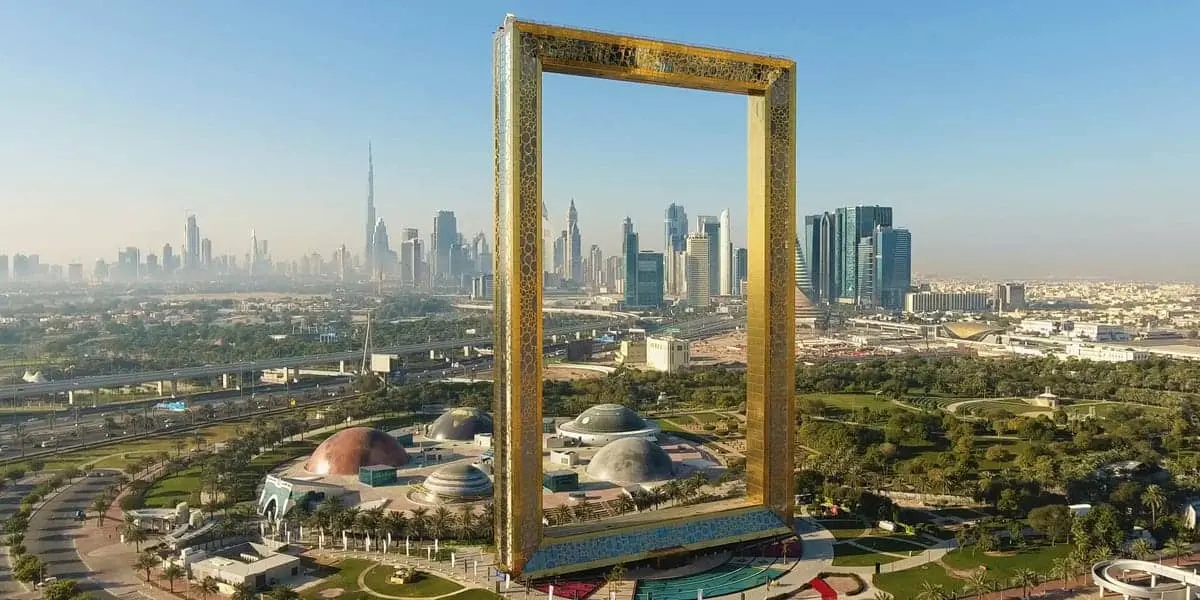 Panoramic sunset view of Old Dubai and New Dubai from Dubai Frame